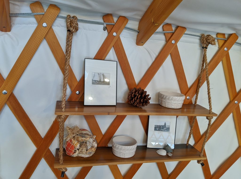 https://www.yurts.com/wp-content/uploads/2020/10/Hanging-shelf-1024x762.jpg