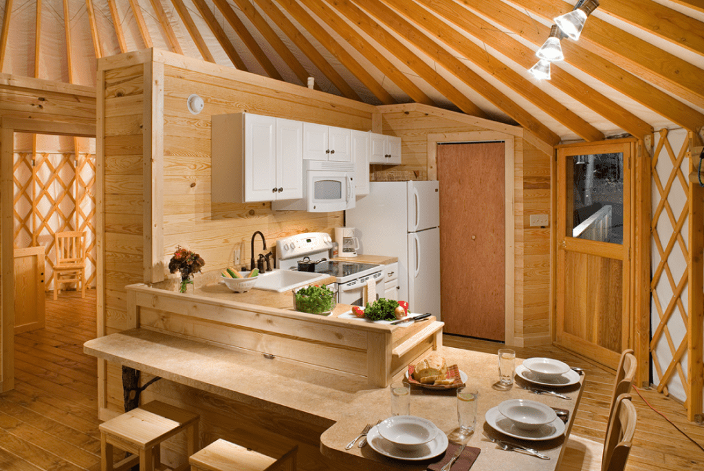 L-shaped kitchen built inside of a Pacific Yurt.